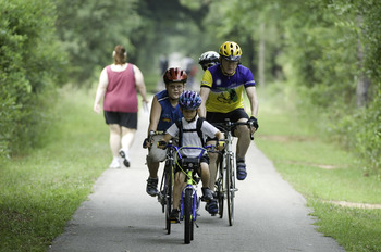 riders on the Tallahassee-St. Marks Trail, part of the Capital City to Sea Trails.