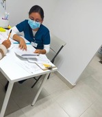 A site coordinator reviewing the informed consent with a patient.