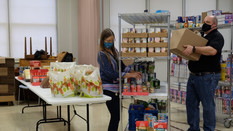 people volunteering at food bank