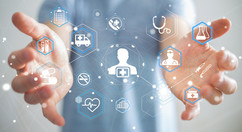 image of two hands around holograms of various health care icons